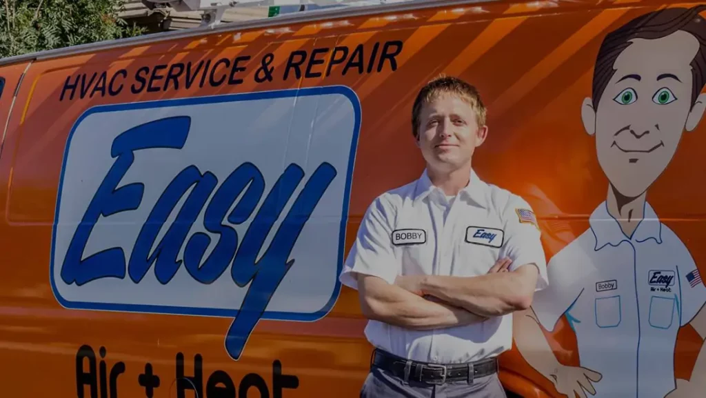Easy Air technician posing in front of van 